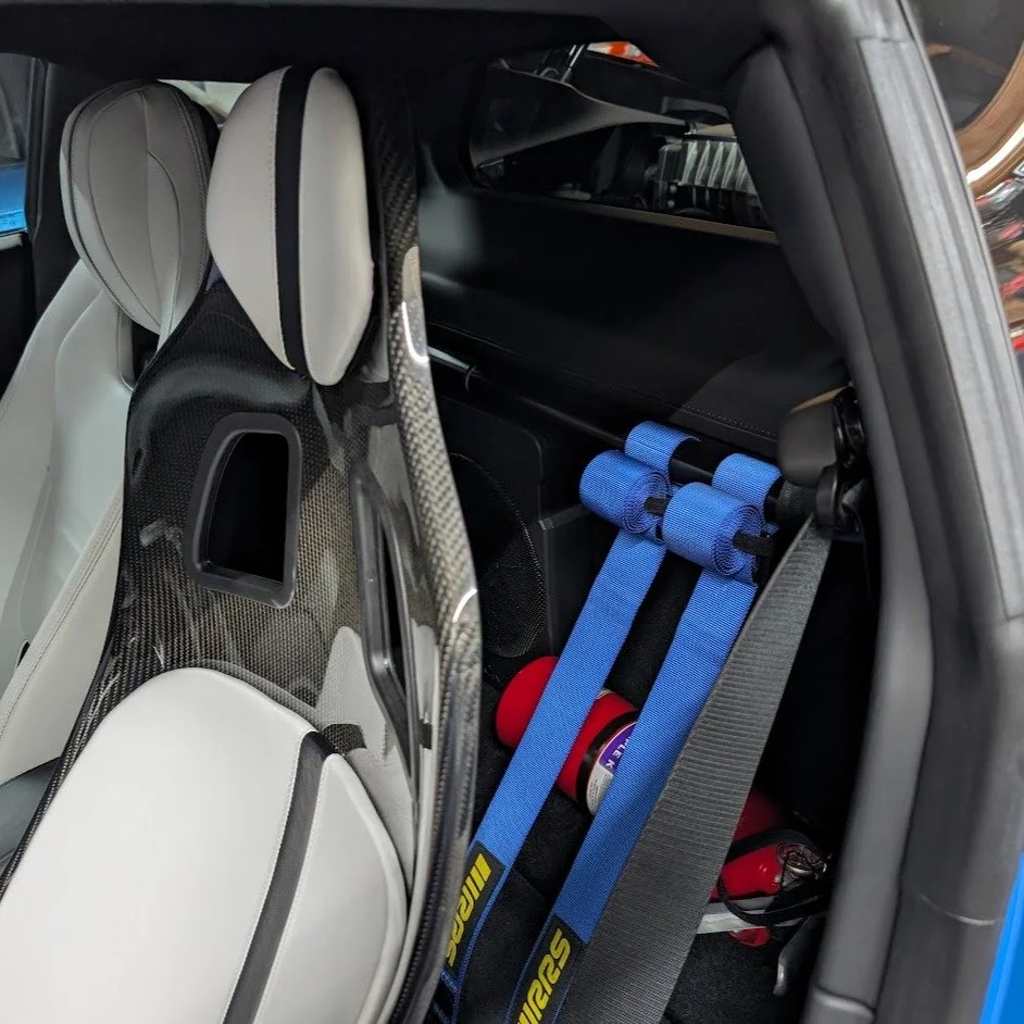 Here is our Lotus Emira QUADloc Harnessbar installed with a 6pt harness by a client and early adopter from TX. Our bar is safe, light, easy to install and retains the rear parcel shelf.
