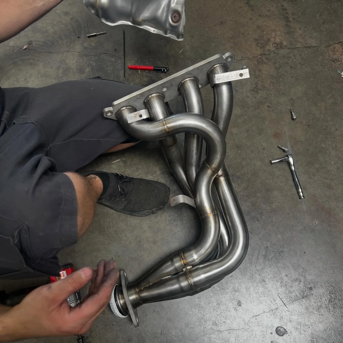 Adding the stock heat shield onto our header provides additional heat protection that is clean and durable - unlike header wrap!