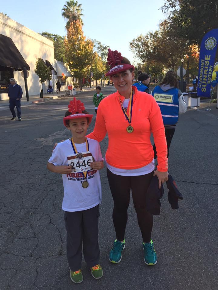 Kelly after running a Turkey Trot with her son Dominic in November 2016