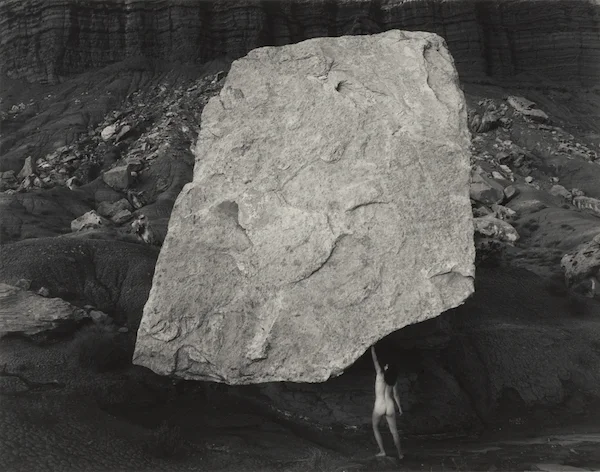 Judy Dater, Self-portrait Holding Up Rock , 1983