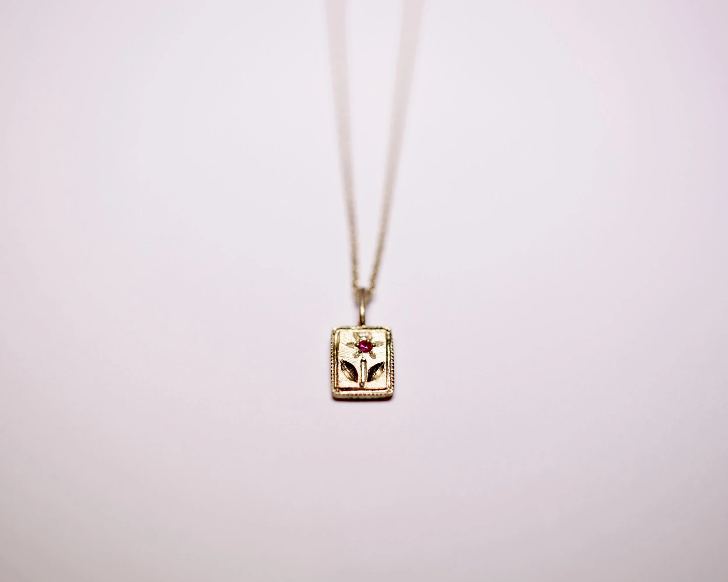 Flower charm necklace