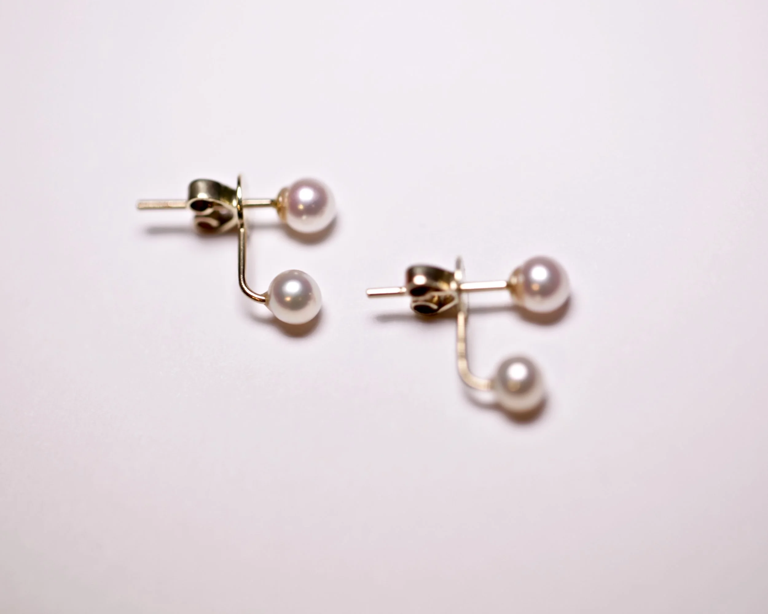Twin pearl earrings