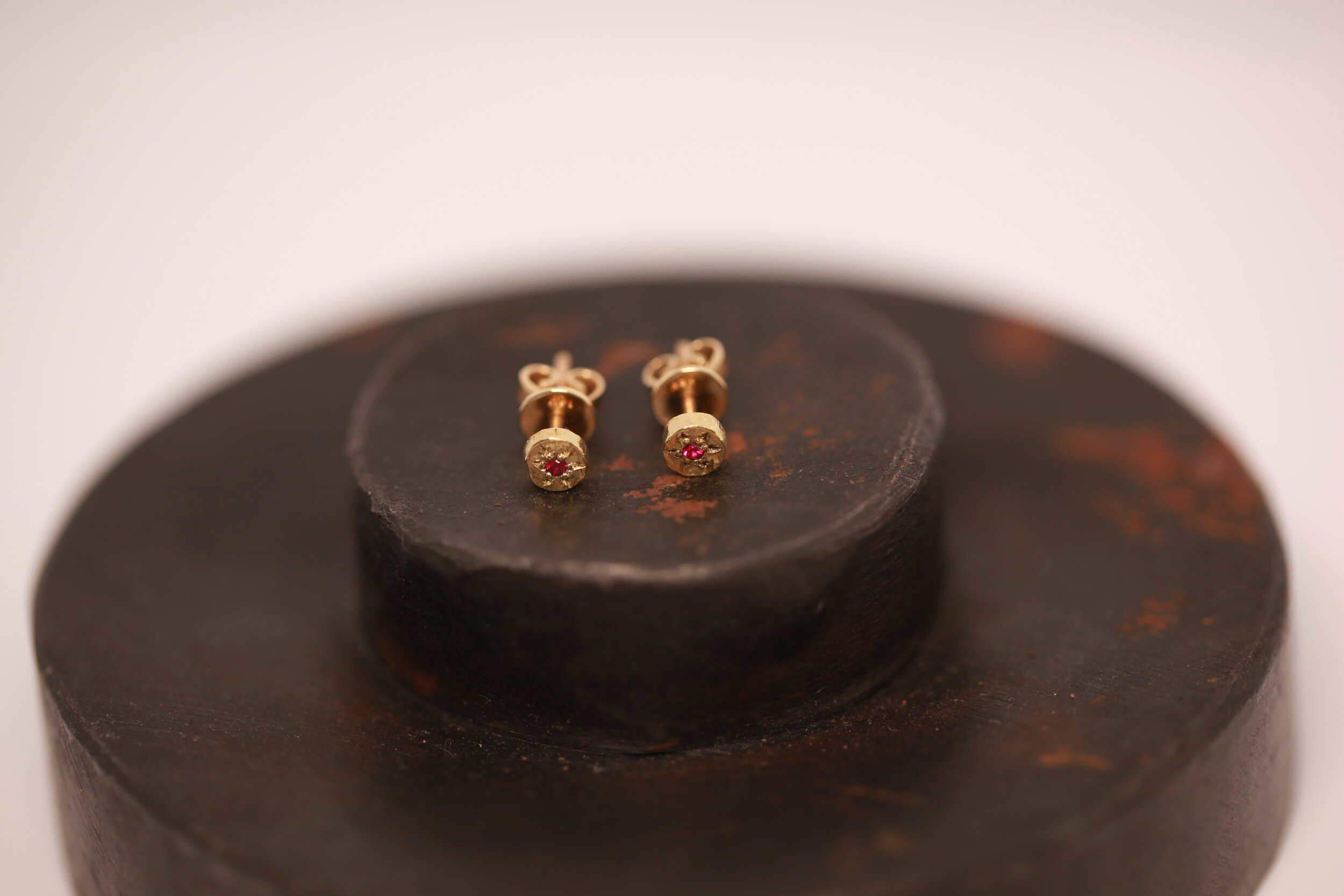 Sole ruby stud earrings