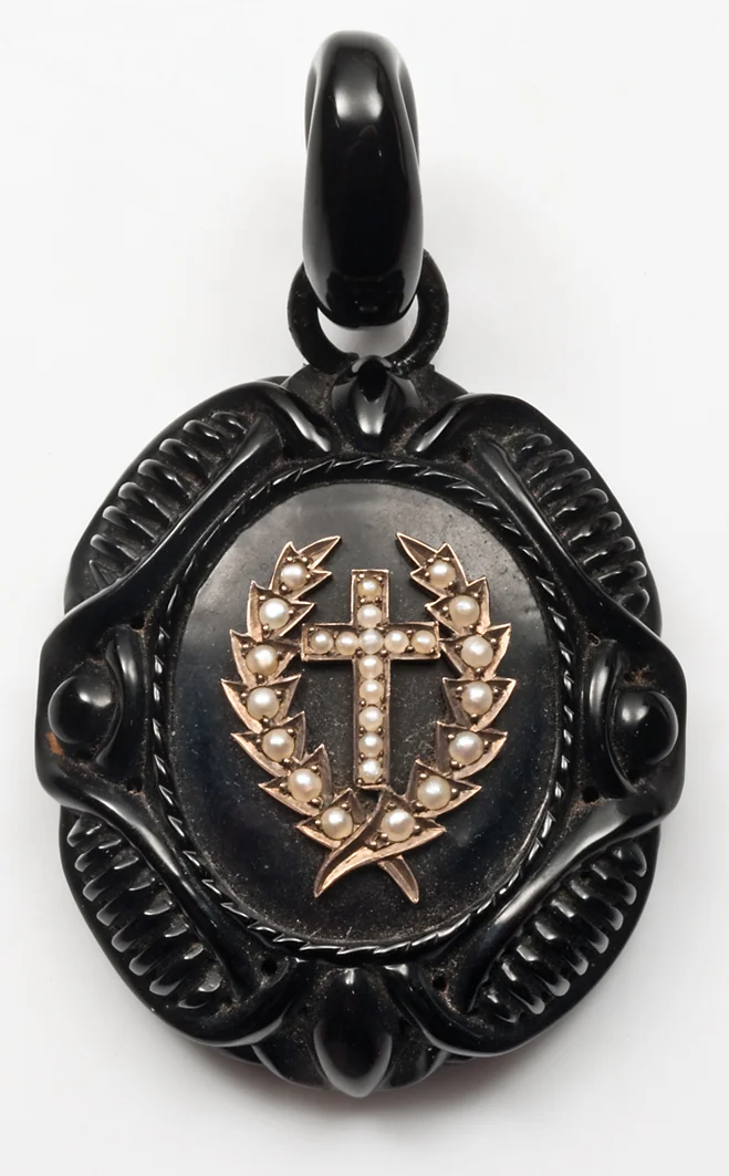 Jet, especially Whitby jet, was immensely popular in the Victorian era. This pendant from around 1880 has a hairwork on the back