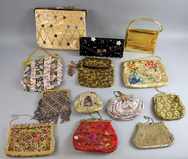 Twelve 1930s to 1970s evening bags in beaded, embroidered, metal and leather finishes, together with an unusual 1950s bag with a lucite handle in the Vintage Fashion & Textiles sale later the same day
