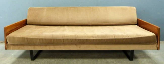 Hille modern design sofa estimated at £300-500.