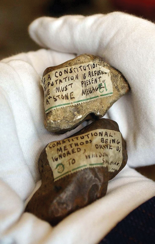 Above: Suffragettes smashed a window at Buckingham Palace in 1914 after King George V had refused to meet them. The protesters were arrested but not charged. The stones were kept by Queen Mary.