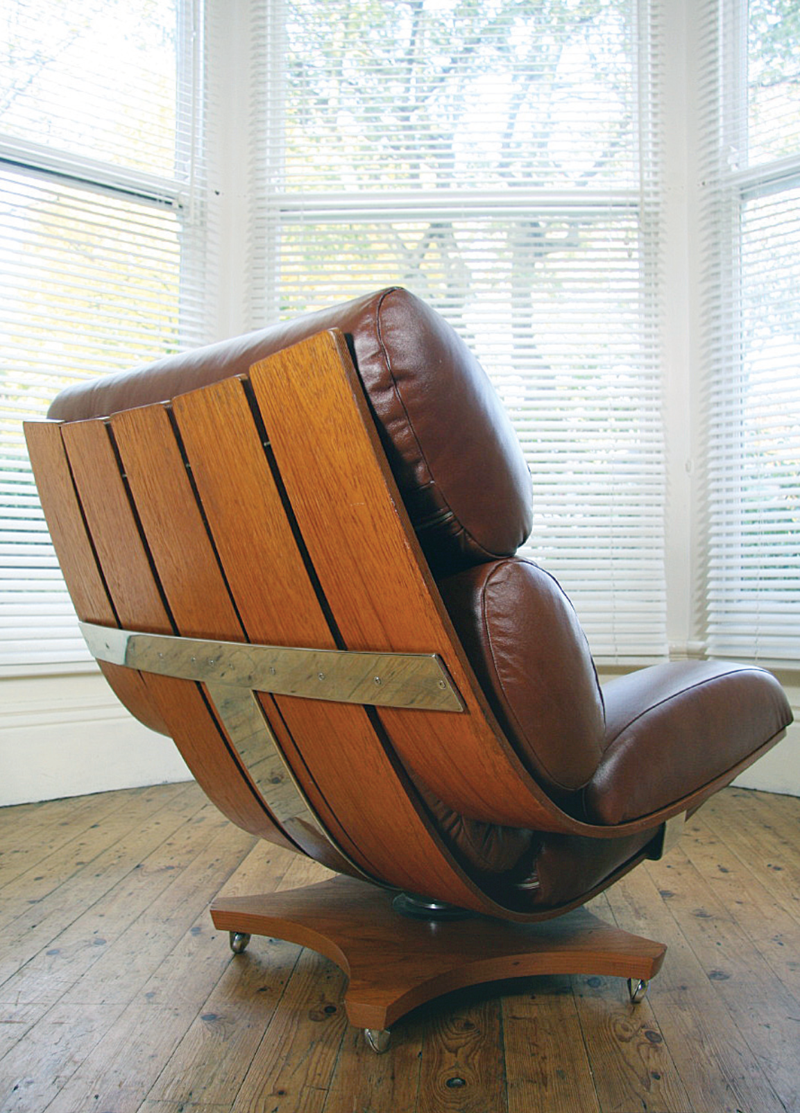 Designed in the late 1960s, this iconic lounge chair is named the 'Housemaster'. They are extremely hard to come by in rosewood, the standard issue being teak. It's incredibly comfortable, spins 360 degrees, and looks amazing both with and without the cushions.