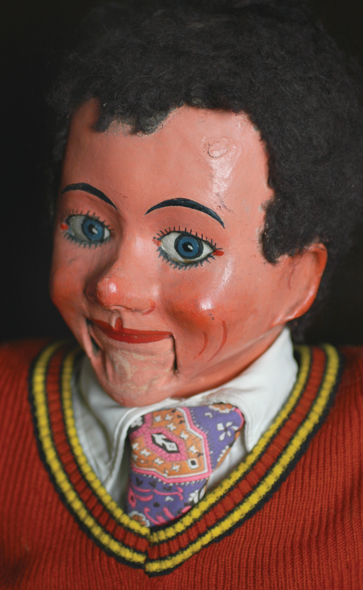 Above: Ventriloquist Harry Parrott owned this figure of a boy. Parrott bought the dummy second- hand in the 1940s and had to give up his clothing coupons to buy it some shoes – the dummy is still wearing the shoes – brand new and still with the utility mark stamped on the sole!