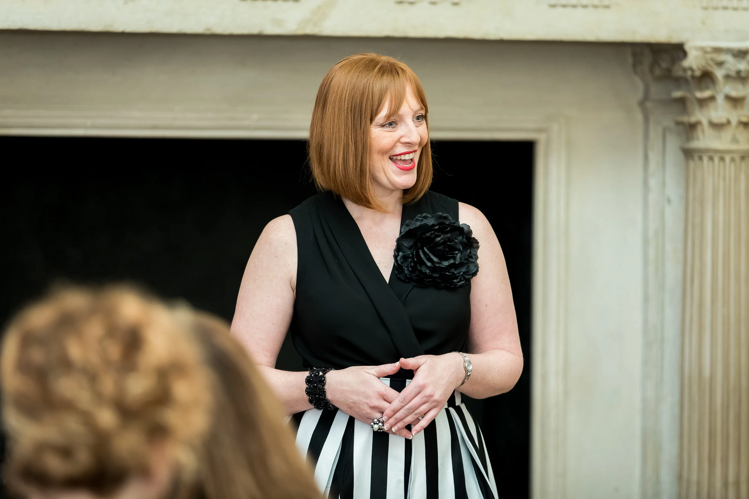 Lori Rae speaking at The Ritz, London England.