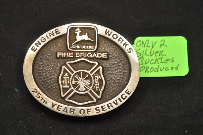 This John Deere buckle is one of the collectibles selling at Sullivan’s online-only auction.