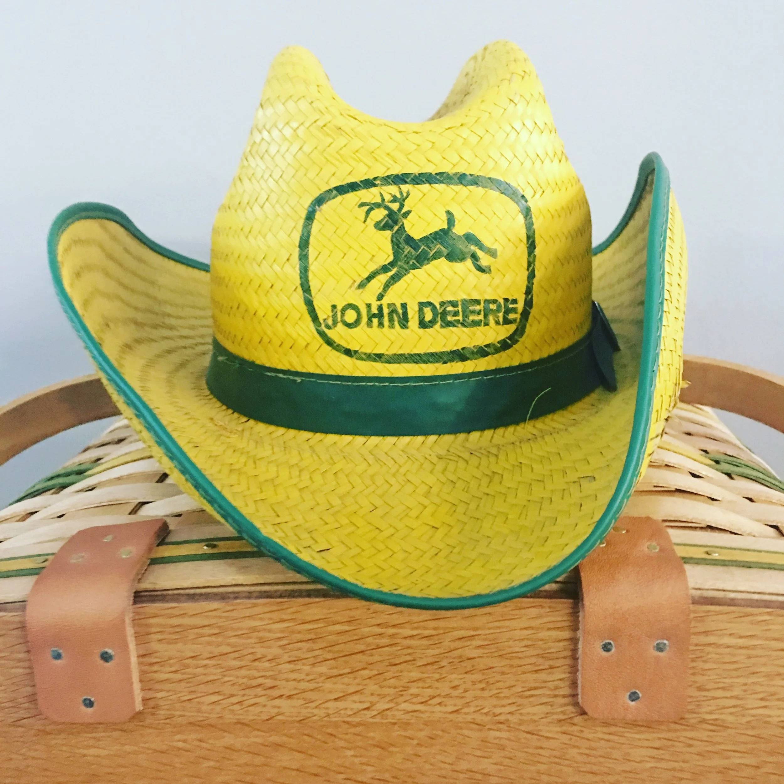 The winter farm toy auctions also have great memorabilia like this original John Deere straw hat.