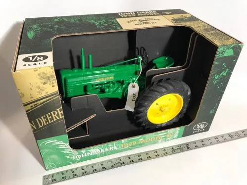 A 1939John Deere Model B die-cast tractor