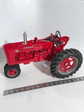Farm Progress Show collector edition Farmall M die-cast tractor, which appears to be signed by Joseph Ertl