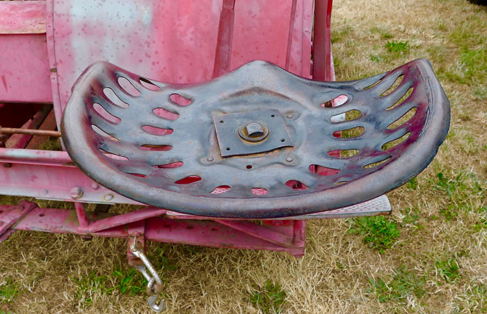 Although offset for better visibility, this old Case seat does not exactly look inviting. What about that bolt in the middle?
