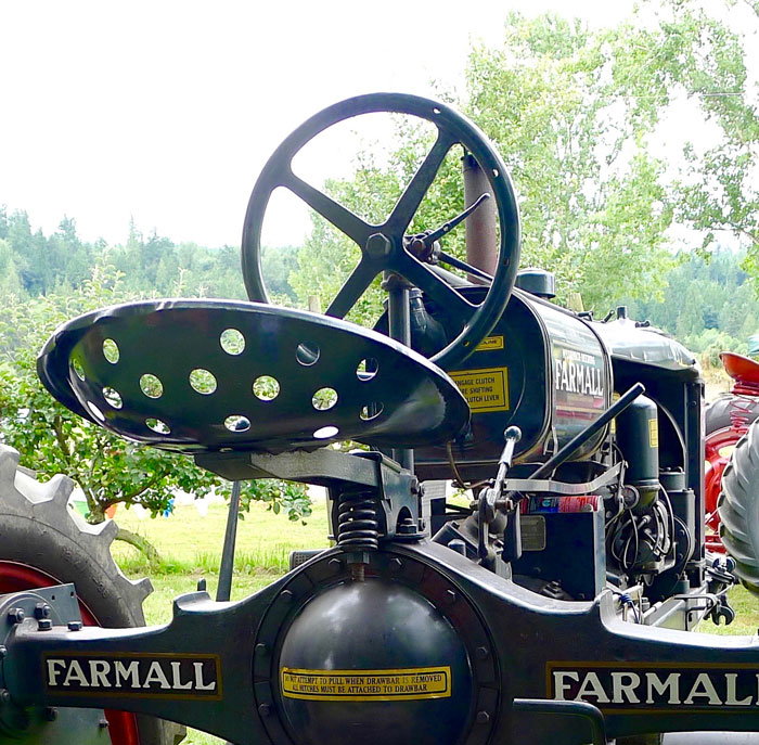 The seat on this McCormick-Deering Farmall was deep enough to give some security and had plenty of air circulation, but still does not look too comfortable.