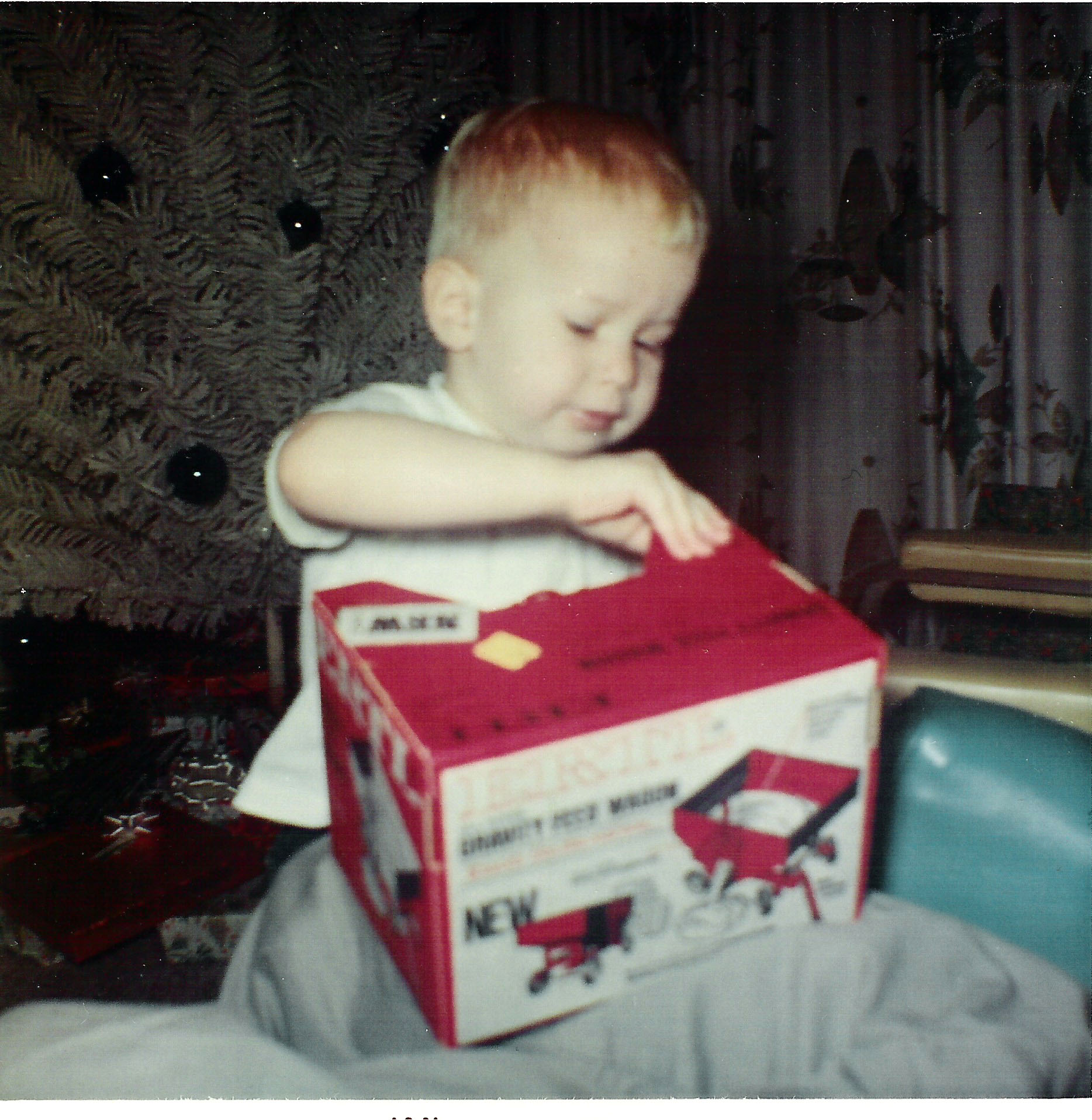 It wasn’t green, like my John Deere toys, but there wasn’t an orange Killbros gravity box replica available in 1968.