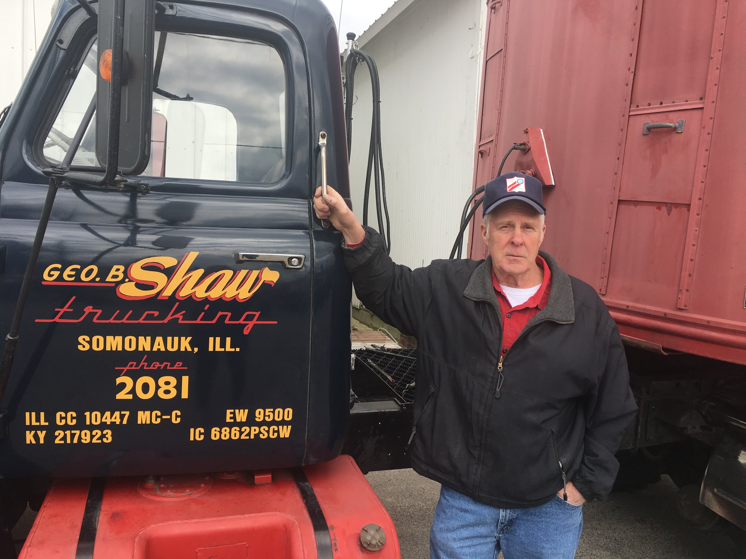 Jerry Shaw stands near his rolling tribute to his father. He brought this museum to the Sublette Farm Toy show.