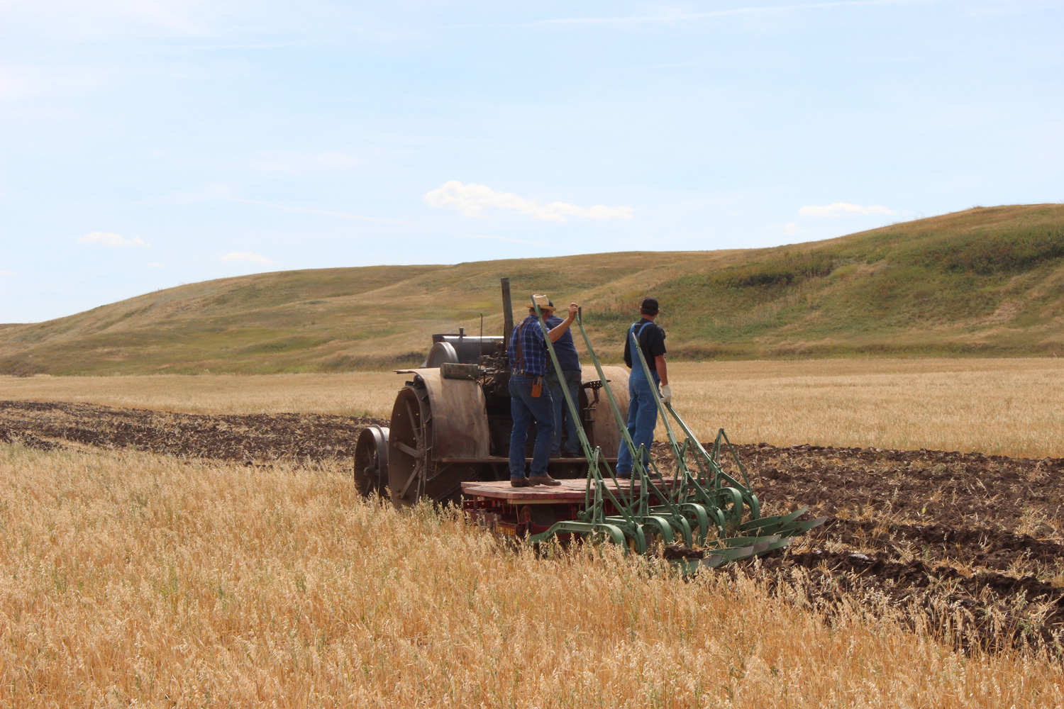 The plowing recaptured the feeling of the past with heavy tractor power, challenging the prairie. Plowing is a lost art in many areas, but these crews did it well. Photo Luke Steinberger