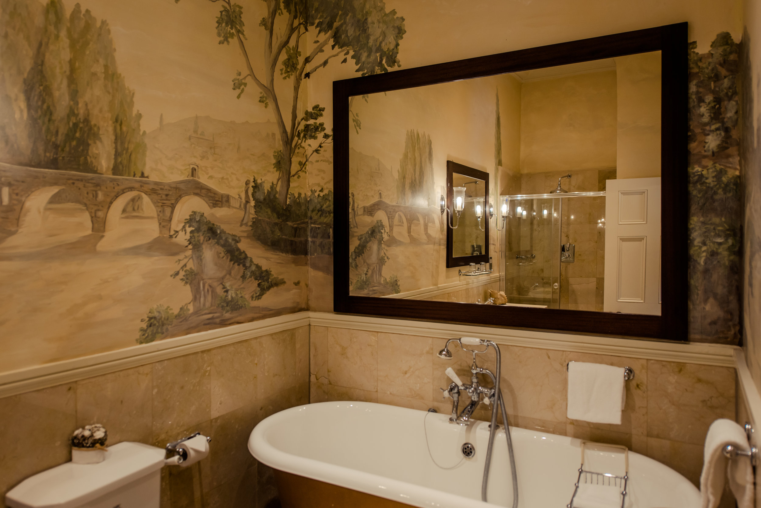 Tulfarris Hotel & Golf Resort bridal suite bathroom with large mirror over bath.jpg