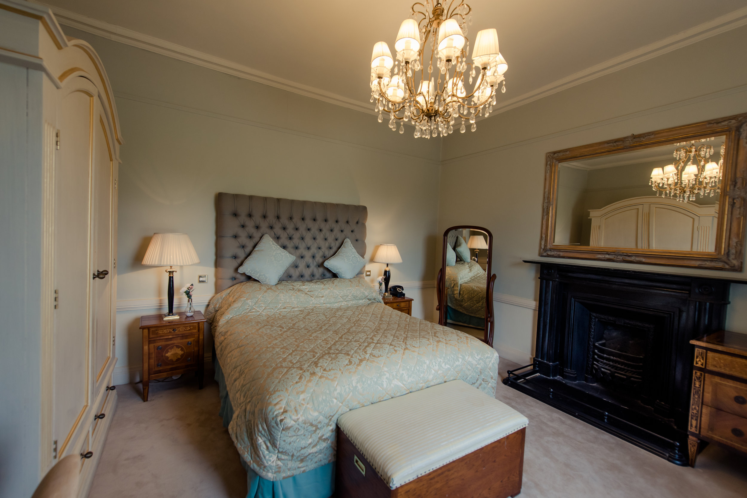 Tulfarris Hotel & Golf Resort Manor House bedroom with light blue setting.jpg