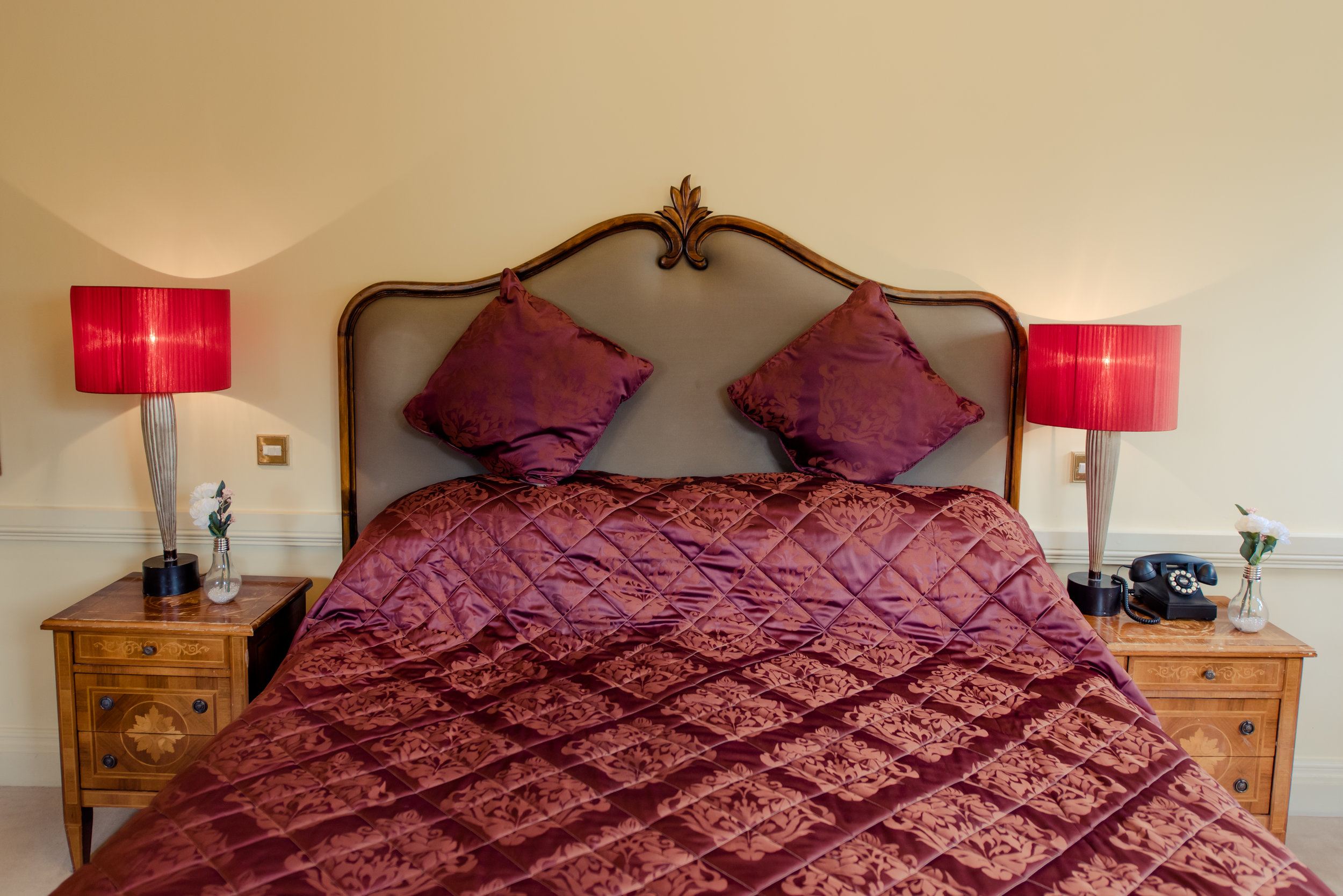 Tulfarris Hotel & Golf Resort Manor House red setting bedroom.jpg
