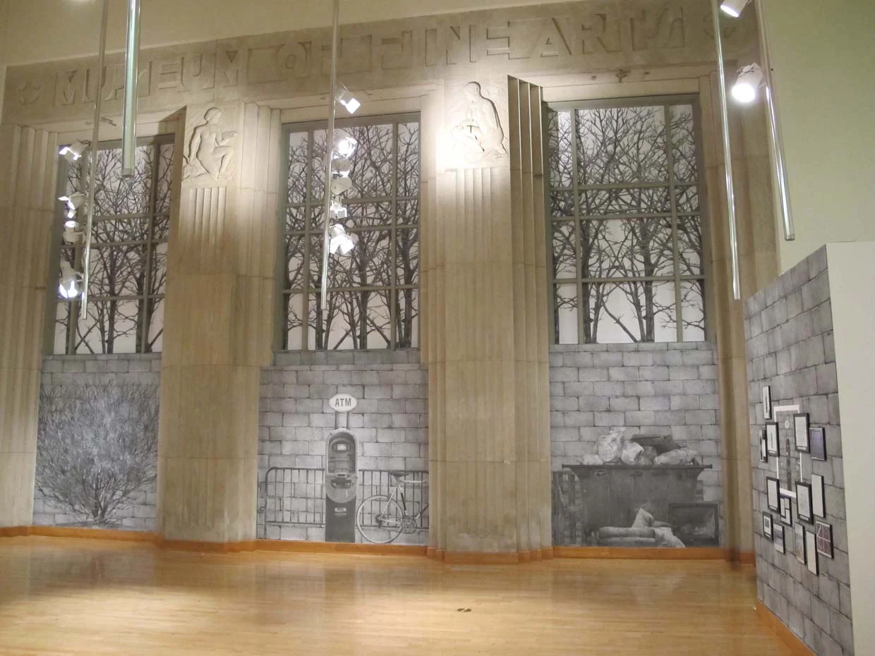 Three Scenarios in Front of Cinder Block Walls with Trees in Background