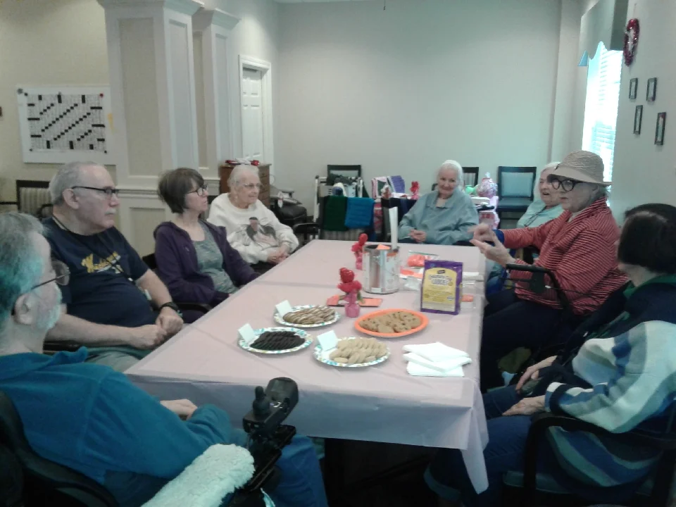 A group of residents at The Bickford attend a presentation about Random Acts Matter by Pat Reding.