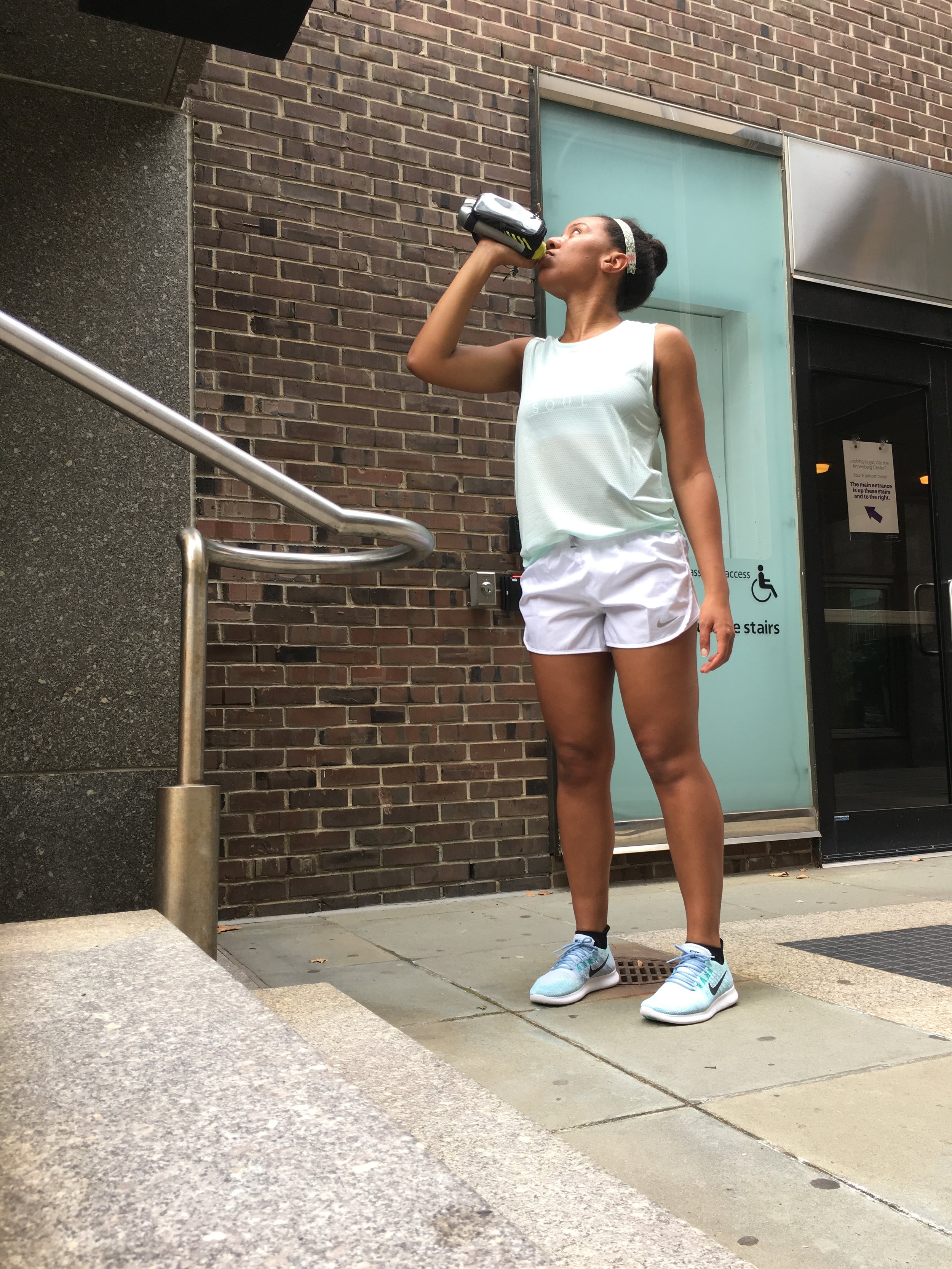 BYO water with a handheld (and insulated!) Nathan water bottle.