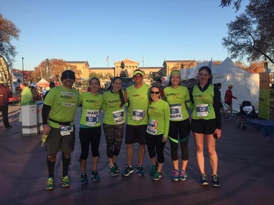 Athlete Mark McCowan with his guides during Philadelphia Marathon weekend.
