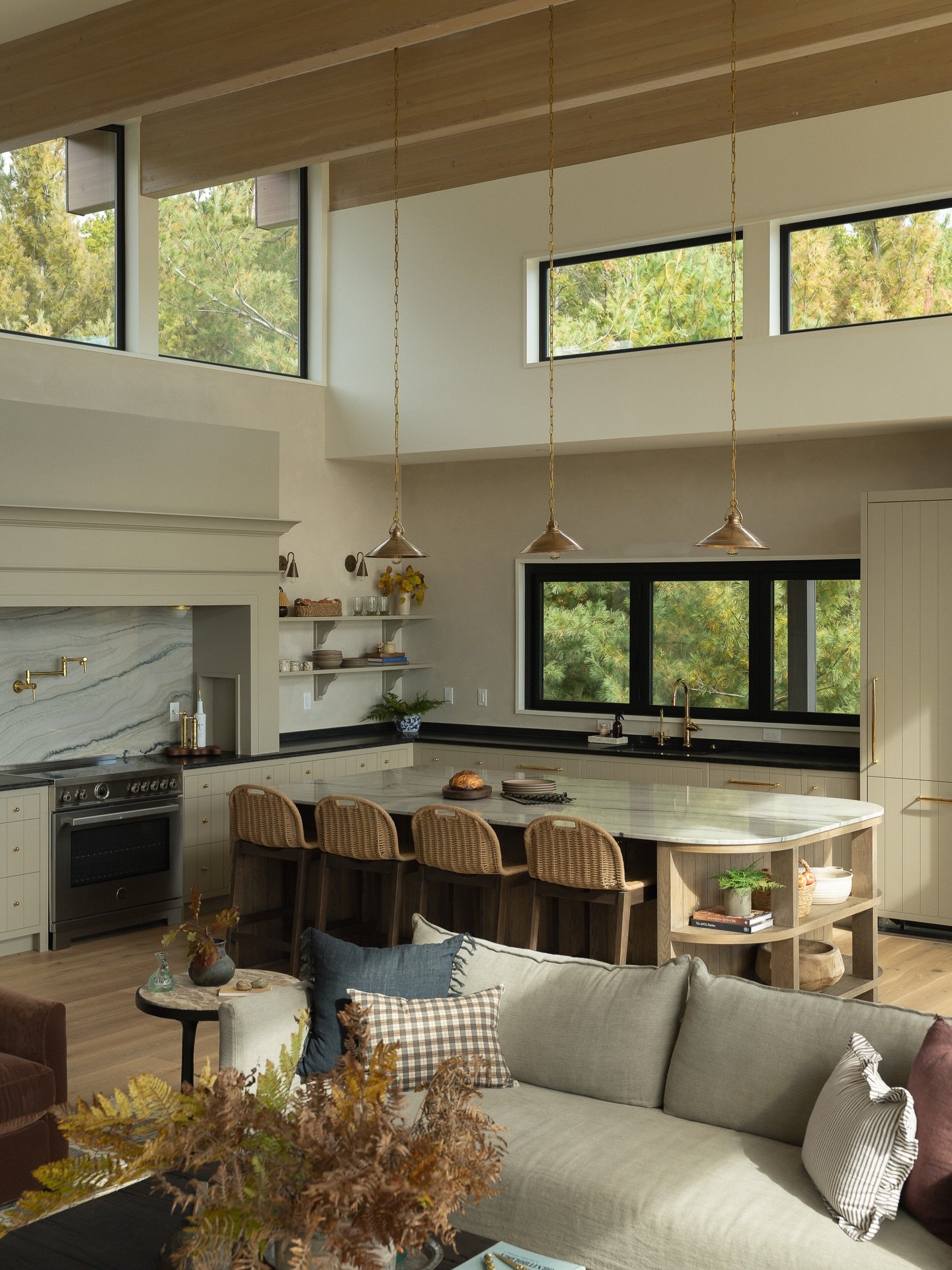 A love letter to this kitchen.🤍

Every little detail was designed with love, from the cabinetry stain + door design, living metals, custom hood surround, stone details and lighting. Inspired by what Northern Michigan does so well, we let the palette