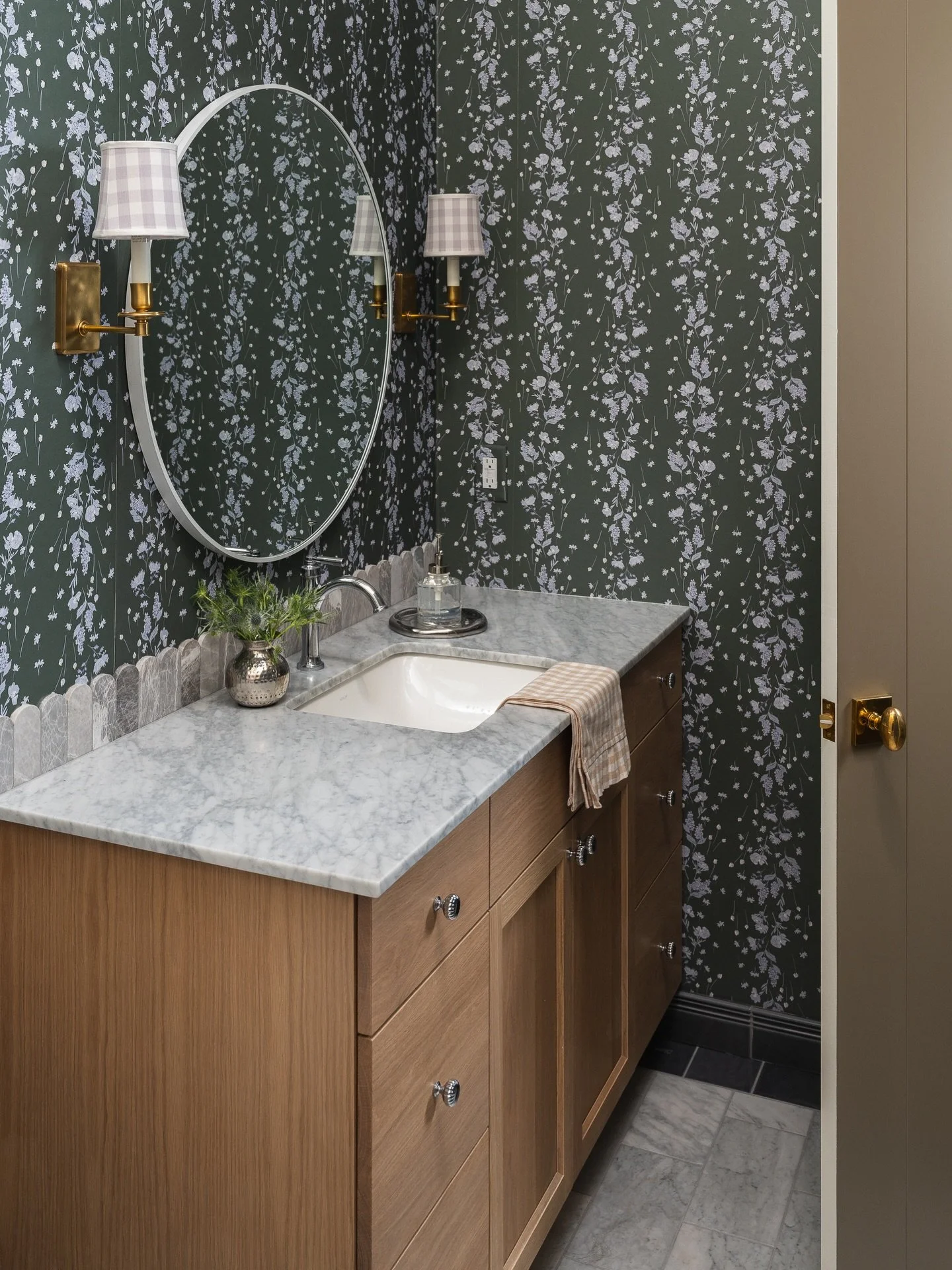 For the girls.🌼 

Pattern play. Color confidence. The cutest gingham sconces. And a scalloped backsplash that probably had the tile installer somewhere between cursing our name + singing our praises.

The design of this special bath took some risks 