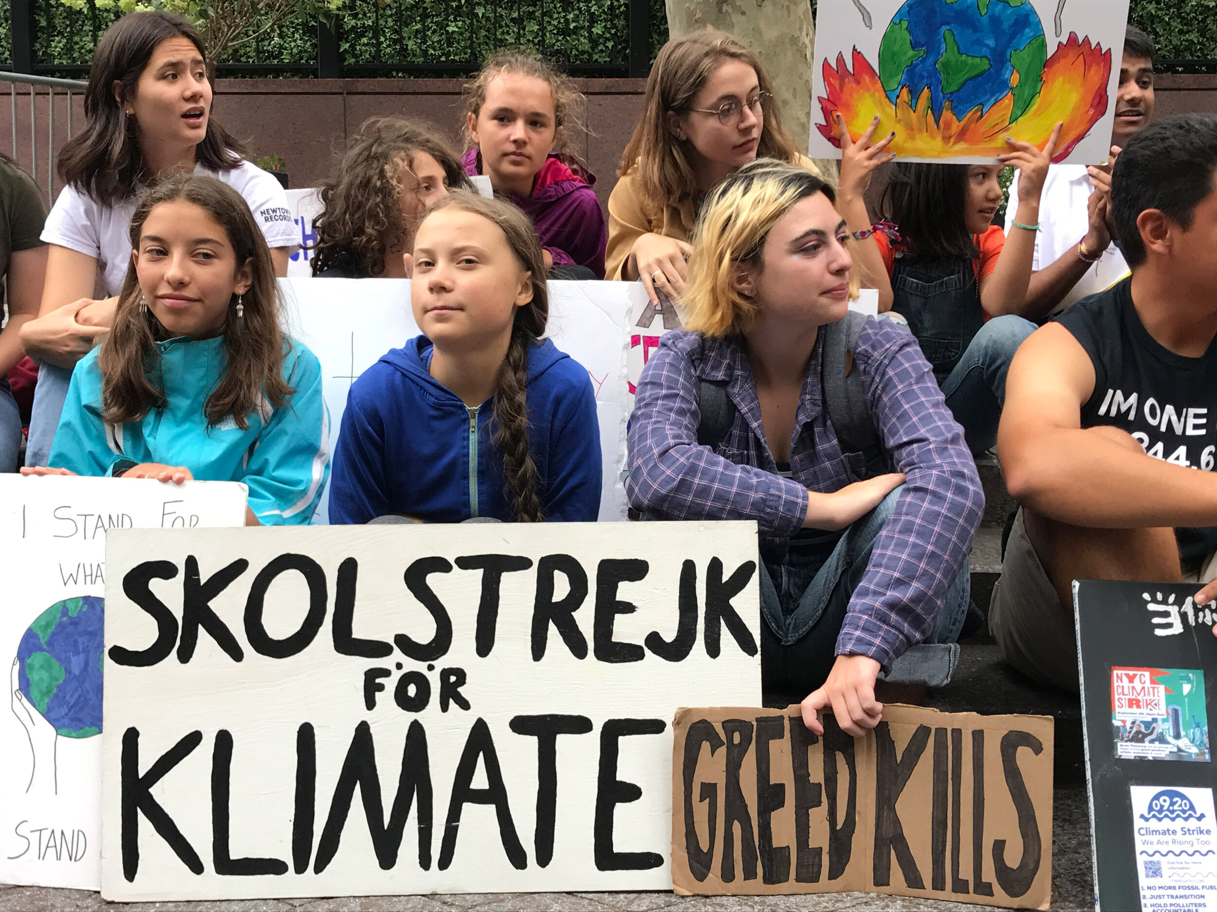 Climate Strike UN Sep 6 Greta smiling in blue hoodie .jpg