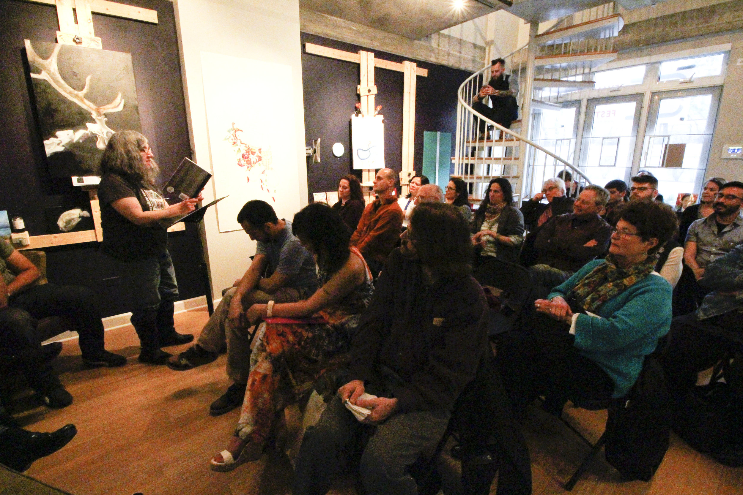 Pamela Miller reads to a packed house at Sidetracked Studio.