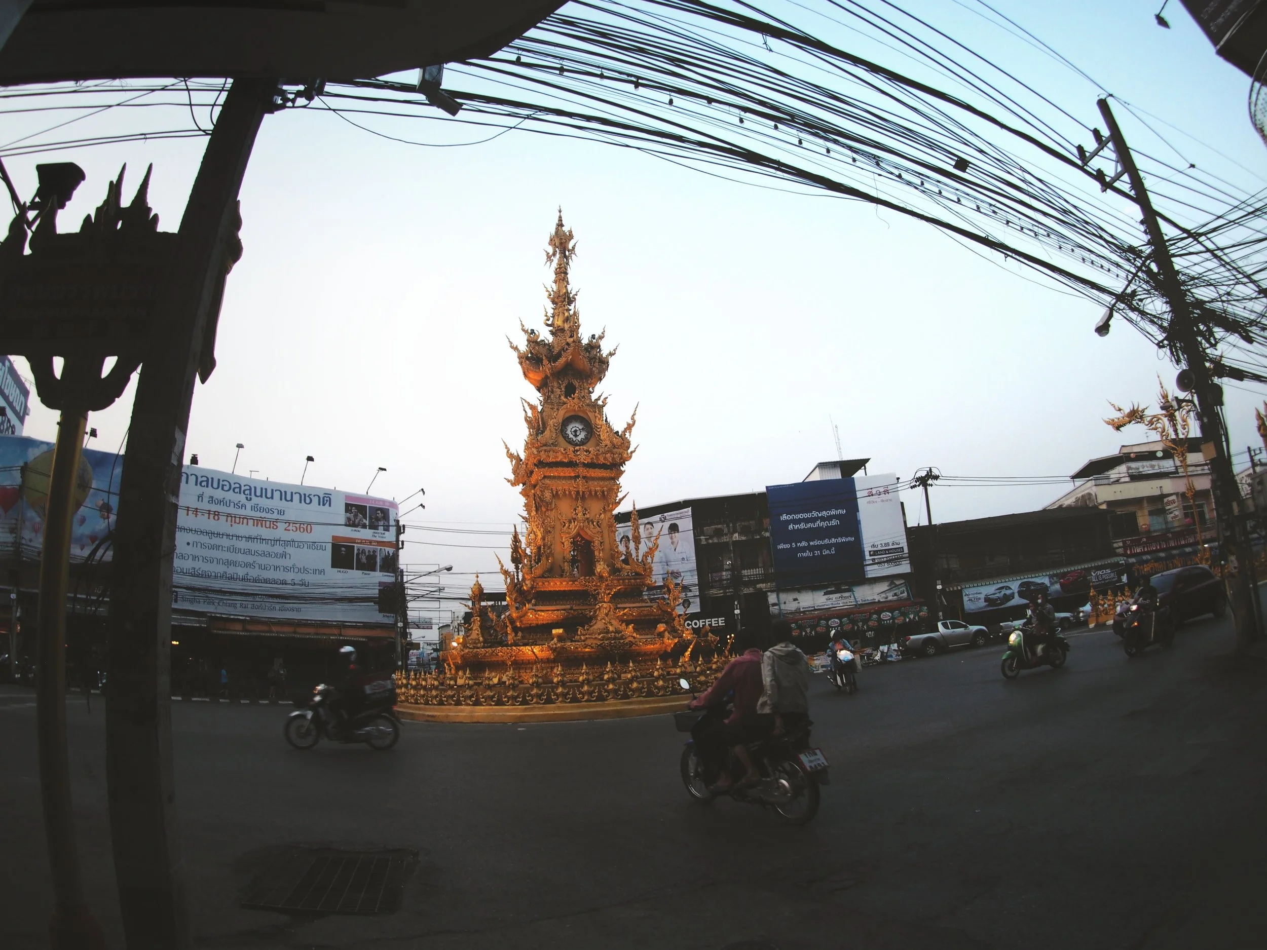 A relatively calm roundabout around the Chiang Rai clock tower. 
