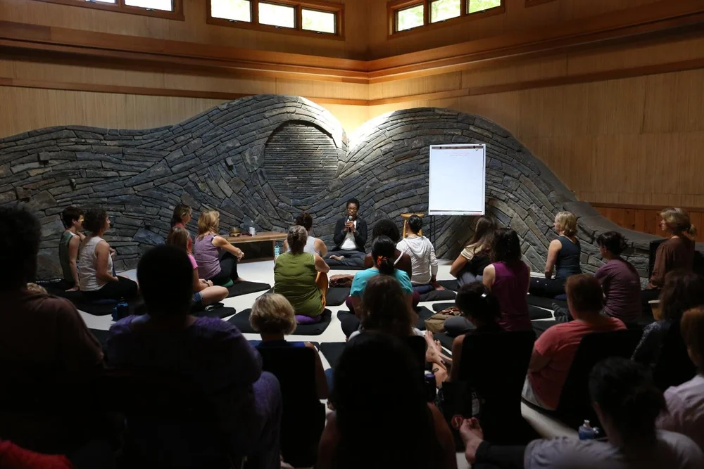 A workshop room at Omega Institute, the group seated in a circle