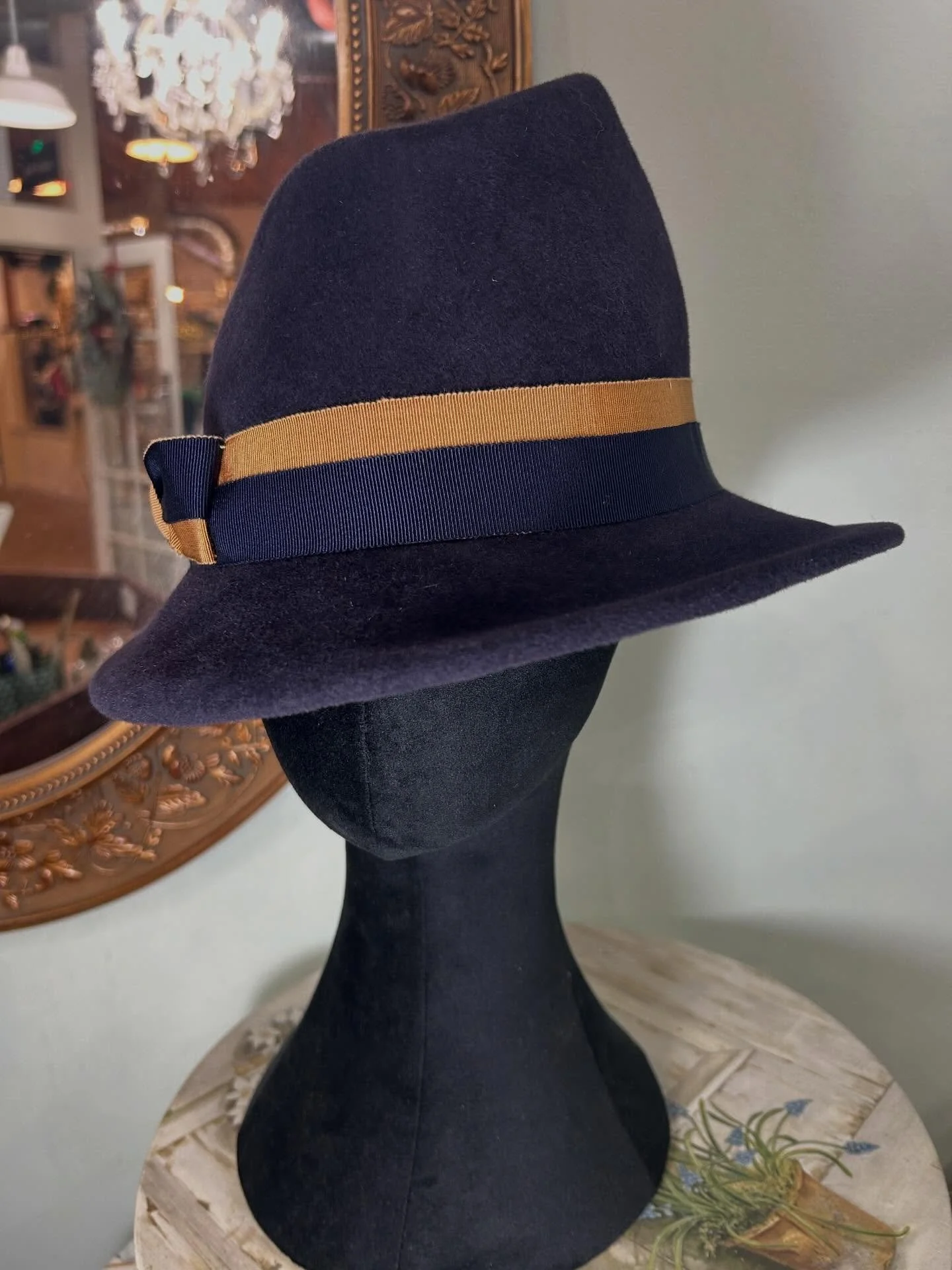 Navy blue fur felt ladies &ldquo;fedora&rdquo; with a slanted crown just put out in the store today. Double grosgrain banding with bow along with a hand rolled brim edge. Perfect for today&rsquo;s fashions but also great for a vintage, 1930/40&rsquo;