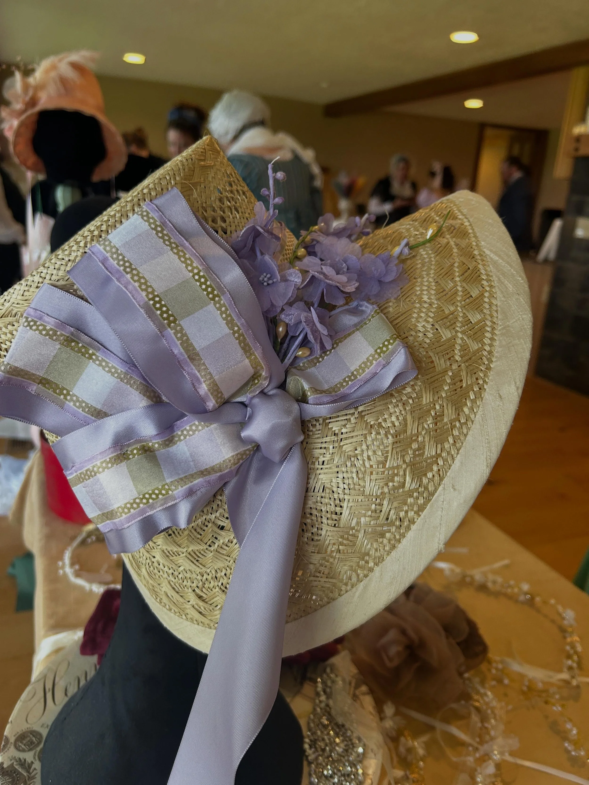 Realized I never posted some of the Regency bonnets and hats I made for the Oregon Regency Retreat. Fancy natural straw with lavender trimmings and a high peaked brim edged in silk. #regencybonnet #strawbonnet #historicalhat #regencyfashion #customha