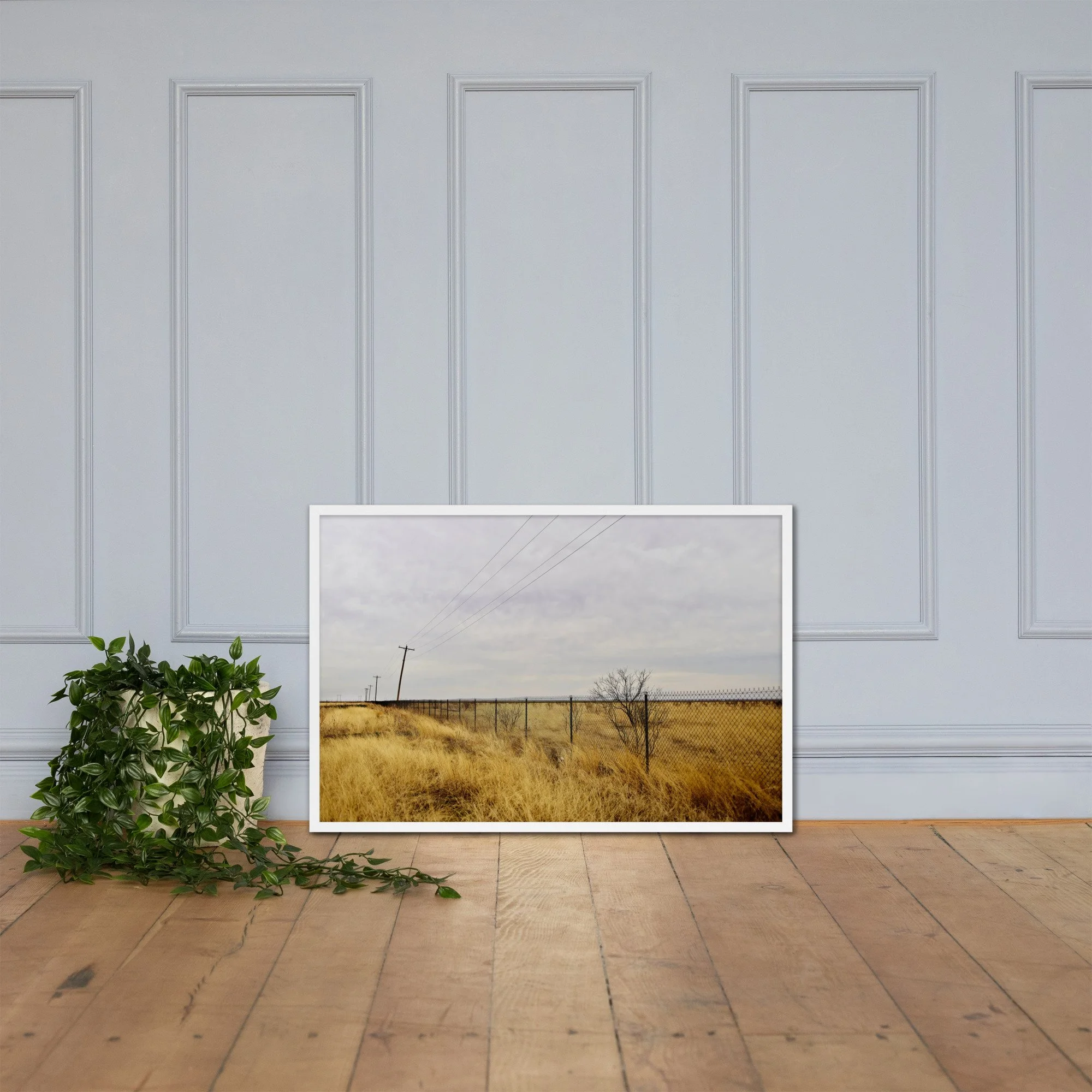 FENCE LINE / 003 framed fence and utility-pole photograph by Nathon Ruehl on a white molding wall