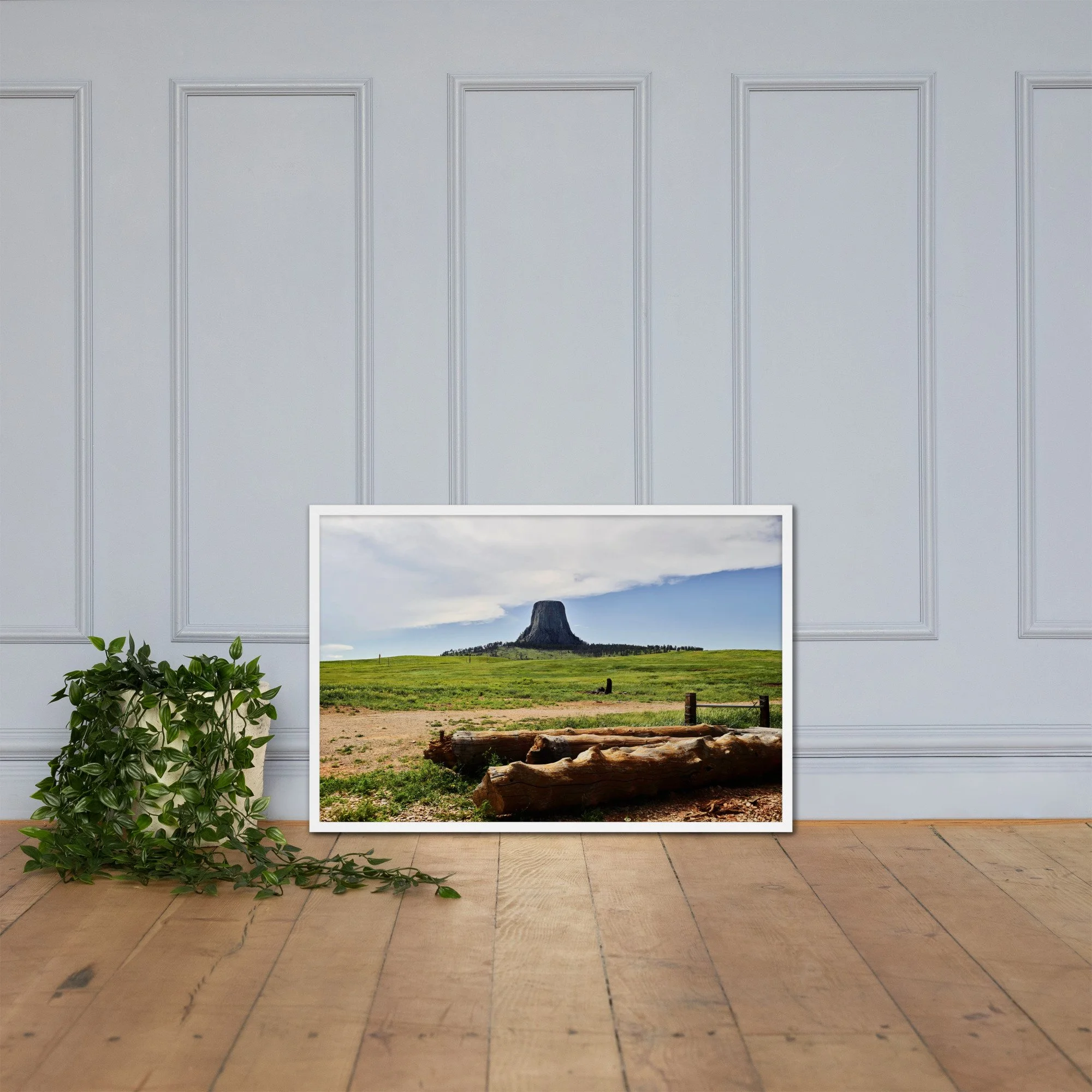MONOLITH / 004 framed prairie stone tower photograph by Nathon Ruehl on a white molding wall