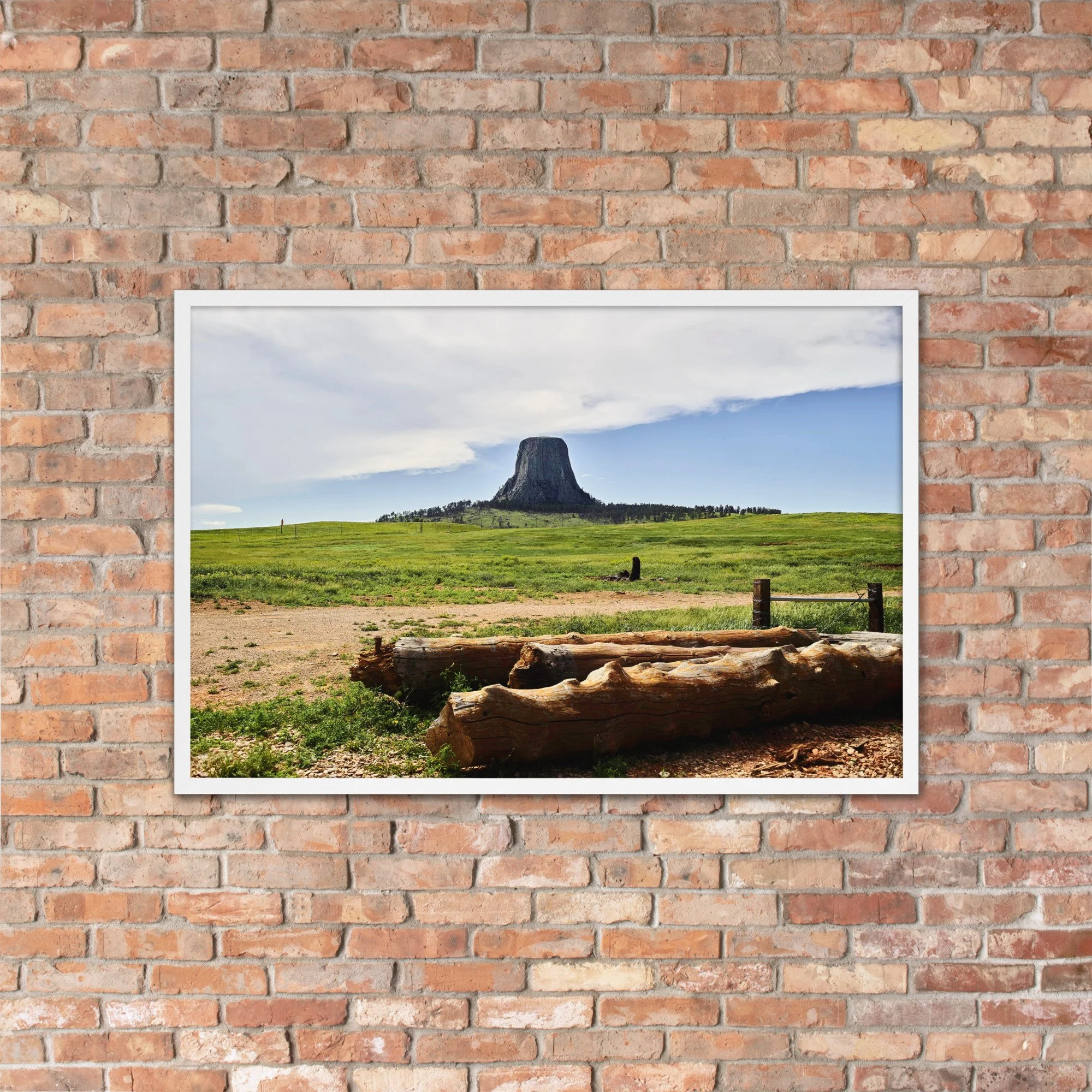 MONOLITH / 004 framed prairie stone tower photograph by Nathon Ruehl on a brick wall