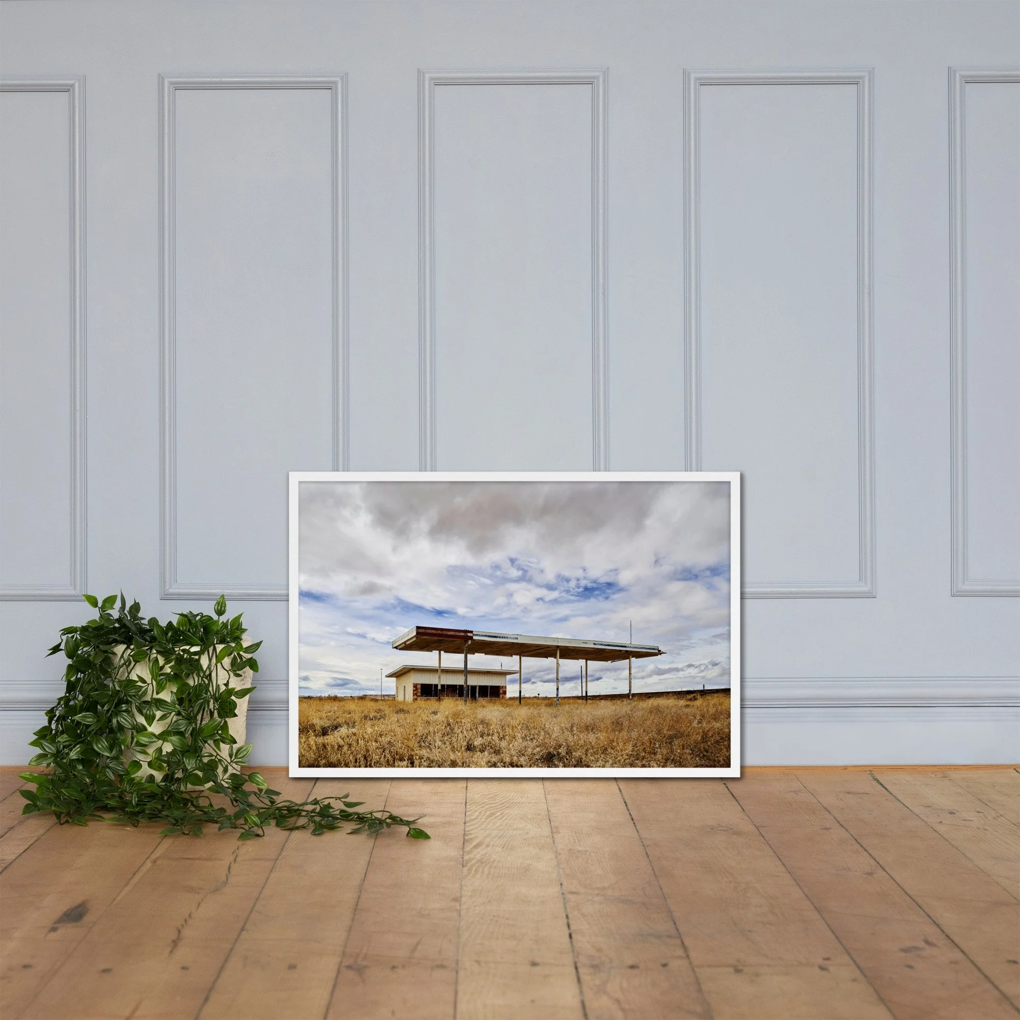 VACANCY / 006 framed abandoned roadside station photograph by Nathon Ruehl on a white molding wall