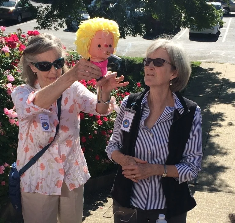 Sharon Klees RN, Donna Chacko MD, and Smokey Sue. Sharon and Donna are members of the Health Ministry of St. Mark the Evangelist Catholic Church in Hyattsville, Maryland.