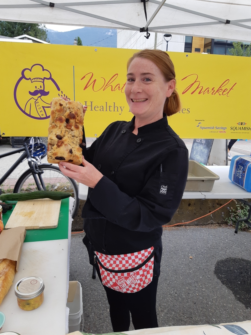 Here we have Chef Moe Ryan of Moe’s Pantry. One of the first vendors of the Squamish Farmers’ Market many years ago. The chef’s recipe for what was made can be found here: https://www.squamishfarmersmarket.com/moeryandinnerplatter Moe made a beautiful, fresh, local market dinner platter up with many different vegetables from local Nutrient Dense Farm in Squamish, and Plenty Wild Farms and Laughing Crow Organics from Pemberton, her homemade jam and balsamic vinegarette, as well as some grilled bread from Rising Knead Bakery from Whistler.
