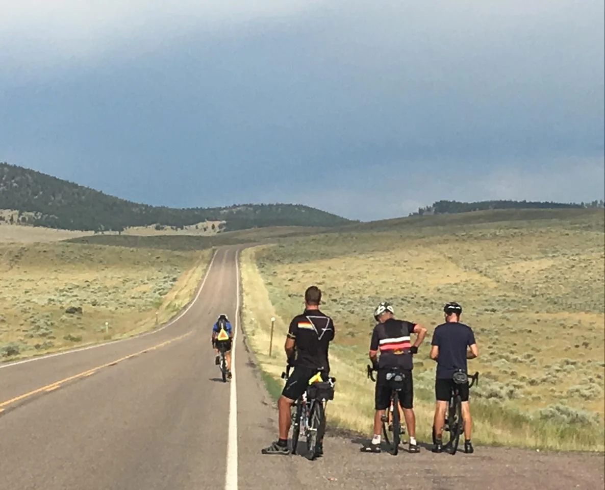 Barry, John and I were doing a "map check" aka rest stop when Christine came by us. (Norm took the picture.)