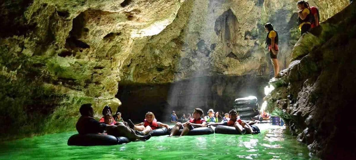 CAVE TUBING & ZIP LINE A thrilling experience awaits. First a boat ride to Belize City where your bus transfer you on a short ride from the city to the jungle. You will then have a relaxing ride downstream on your personal tube towards Belize’s massive underground cave system. After lunch, enjoy the amazing zip line ride platform to platform through Belize’s beautiful Rain forest. Includes: lunch, drinks, sodas, water. Departs 7:00 am Returns 5:00 pm.