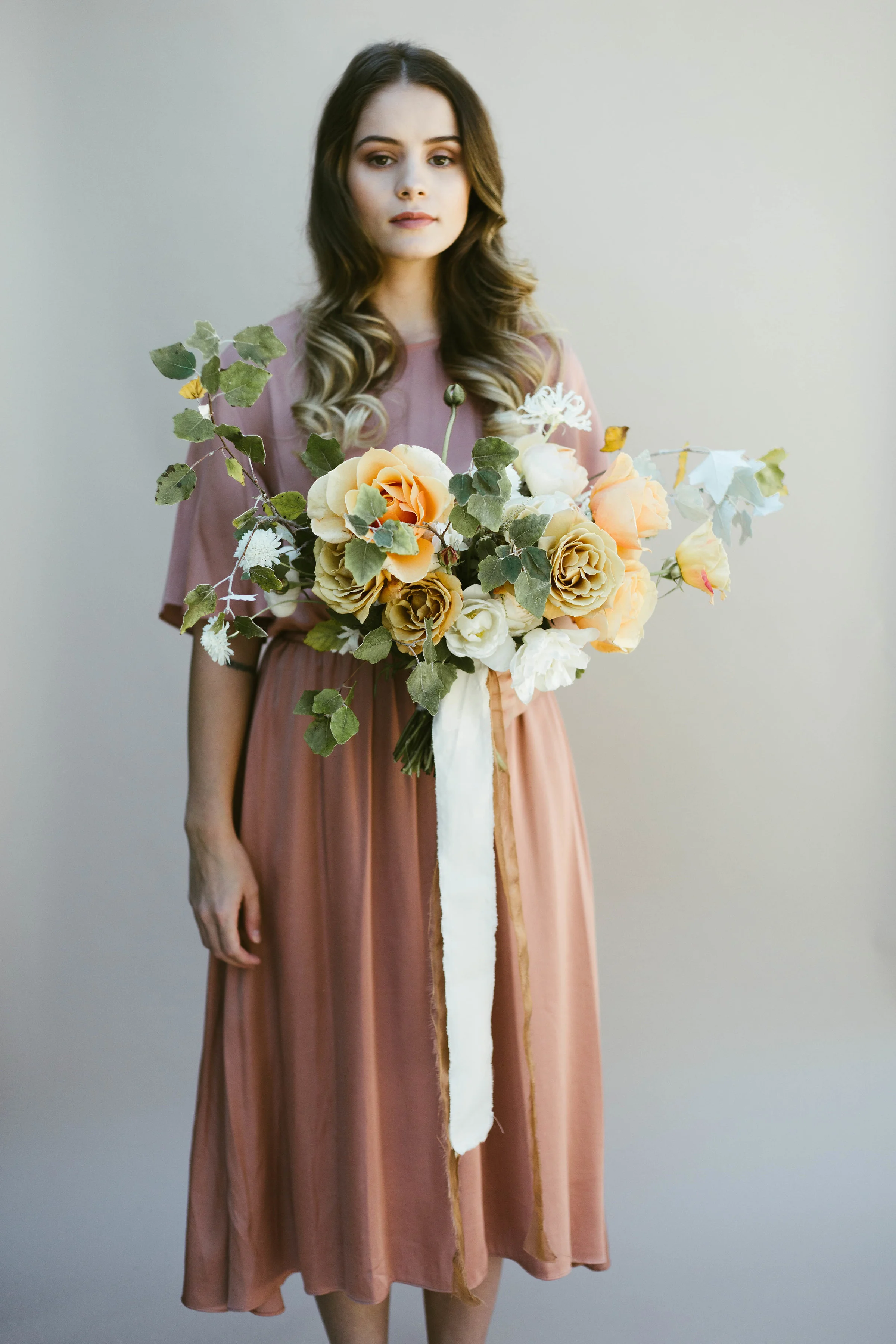 Demonstration bouquet featuring David Austin and Garden roses, Narines, home grown Scabiosa, tulips, poppies and foraged Aspen foliage. Finished with handyed silk ribbons.