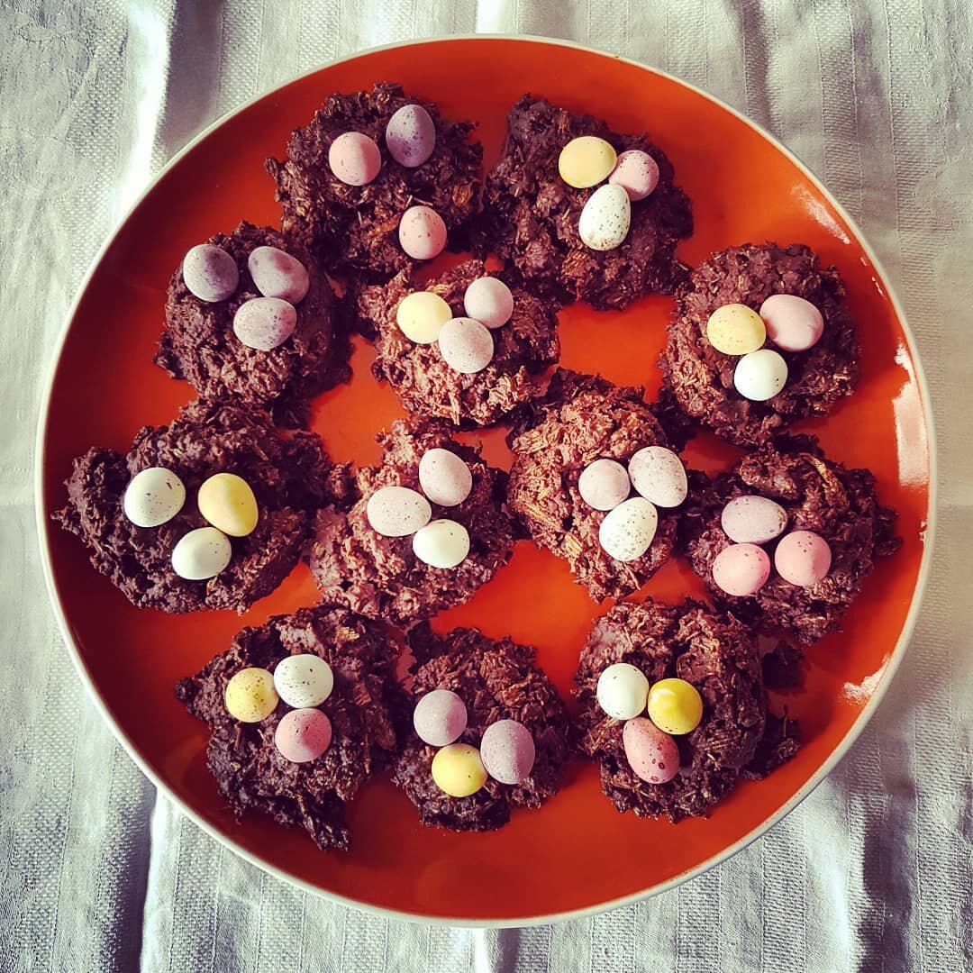 Easter nests: if anyone knows the correct terminology for a collection of chocolate mini egg nests, let me know. A clutch? 

My son made these, they are his first ever experience of cooking. Recipe is:

Crush 160g shredded wheat and mix into 400g mel
