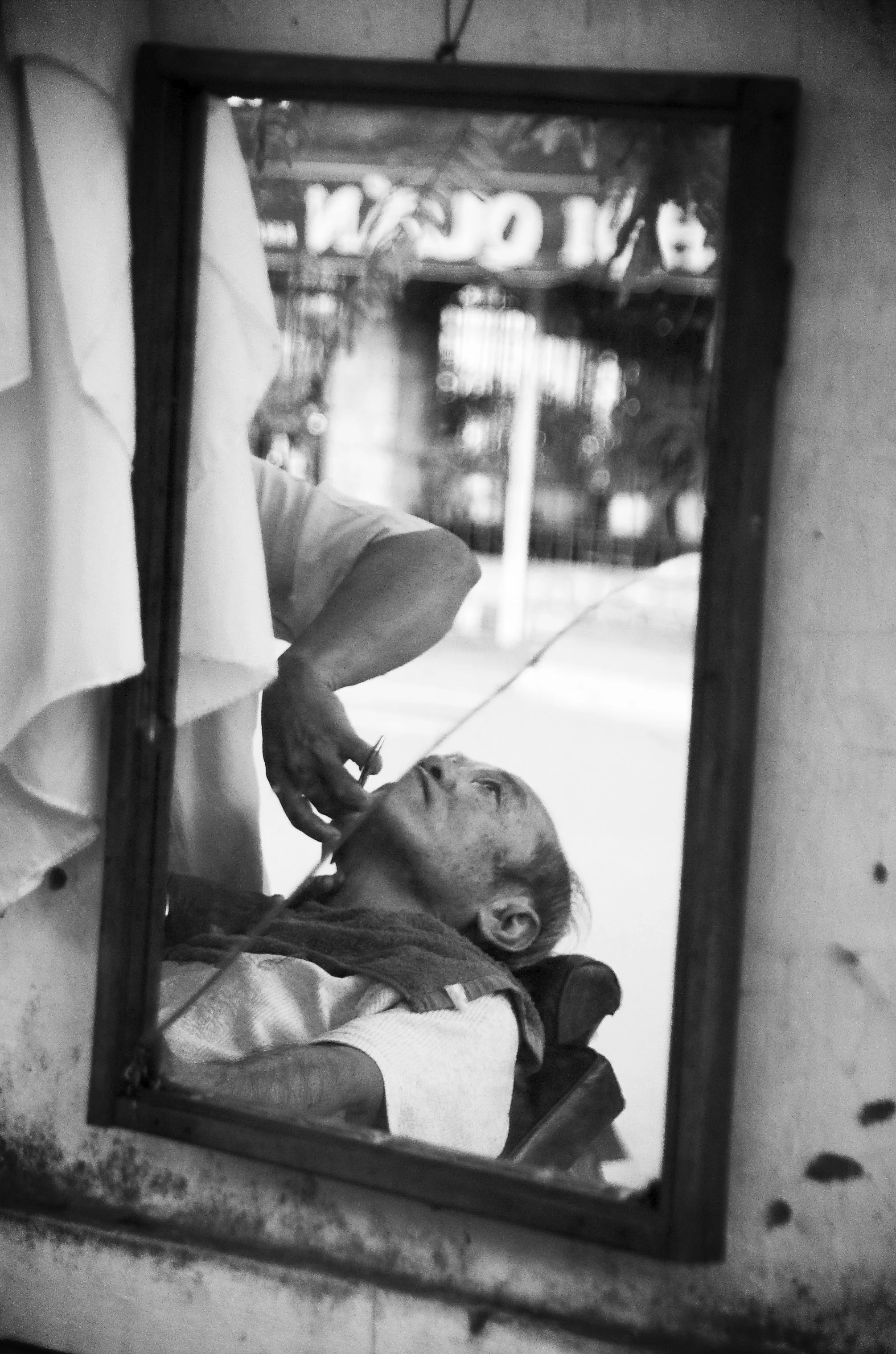 Man having a shave. Vietnam 