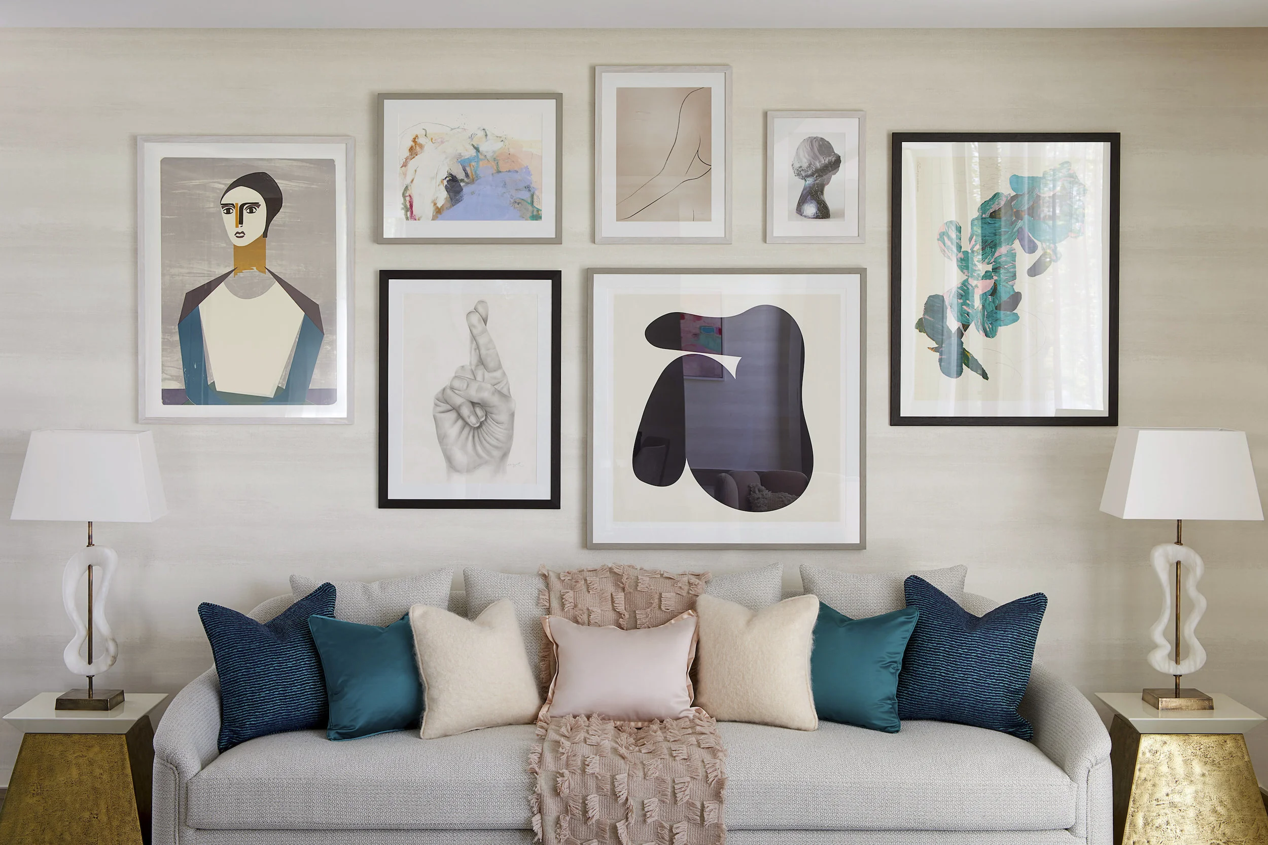 Chiltern Place | MaryleboneLiving Room Cluster Wall - Collage, Oil Pastel, Screenprints, Photography, and Drawings on PaperInterior Design: ElicyonDeveloper: Ronson Capital Partners
